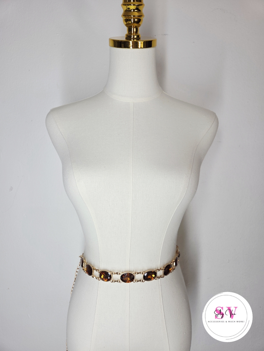Gold chain belt with brown oval gemstone